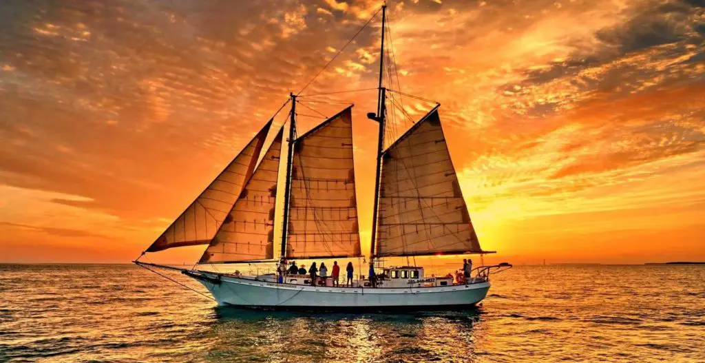 Spirit of independence on a Key West sunset sail navigating the flat calm waters of the Atlantic